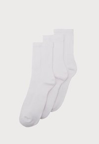 Weißes Baumwollsocken, geripptes Design, mittellange Höhe bis zur Wade, mit nahtlosem Zehenbereich und glatter Textur. Verkauft im Set von drei Paaren.