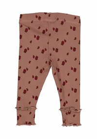 Růžové žebrované legíny s rozptýleným vzorem červeného ovoce, s volánkovými lemy na kotnících a elastickým pasem. Měkká textilie.