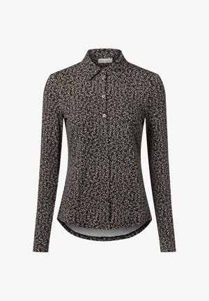 Czarna koszula na guziki z długim rękawem ozdobiona kwiatowym wzorem. Posiada klasyczny kołnierzyk, zaokrąglony dół oraz gładką fakturę tkaniny.