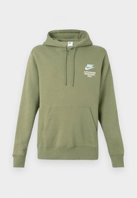 Oliivroheline kapuutsiga särk, mis on valmistatud puuvillasegistusest. Omab eesmist taskut, soonikuid varrukatel ja "NIKE" logo koos tekstiga rinnal.