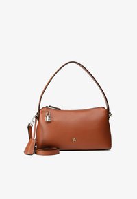 Geselecteerd, cognac brown