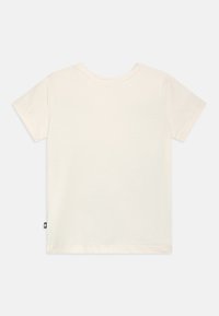 T-shirt in cotone beige chiaro con maniche corte, scollo rotondo e un piccolo etichetta nera in basso a sinistra dell'orlo. Tessuto liscio.