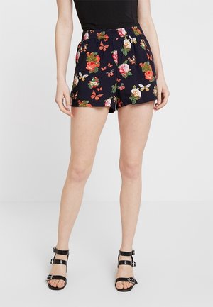 Shorts en tissu noir avec un motif floral et une taille élastique. Présente des fleurs colorées et des papillons avec une coupe décontractée.