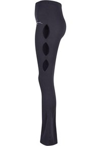 Melnas ribotas legingi ar trim griezumiem sānos. To piemeklē fitēta forma un elastīga jostasvieta ērtībām.