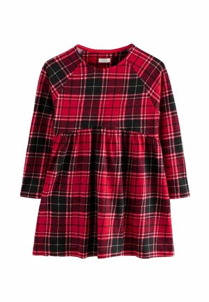 Robe écossaise rouge et noire à manches longues, décolleté rond et taille évasée. Tissu doux avec un motif à carreaux et jupe froncée.
