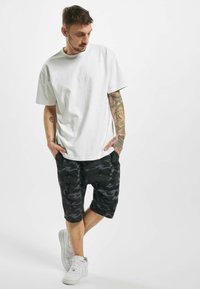 DEF Trainingsbroek - grey camo