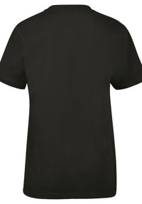 Camiseta de algodón negra con cuello redondo estándar, mangas cortas y un ajuste relajado. Textura suave sin patrones o acentos visibles.