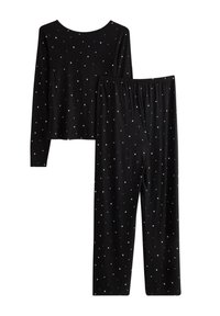 Sorte pyjamas sæt med langærmet top og bukser, prydet med hvidt stjernemønster og elastisk talje på bukserne. Blød stoftekstur.