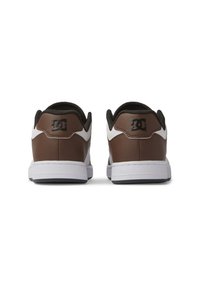 Brown leather sneakers with white accents, featuring a black logo on the heel and a textured black collar, designed with a flat rubber sole.