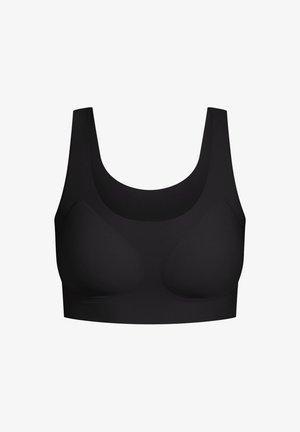Soutien-gorge de sport noir avec un design sans coutures, des bretelles larges et une texture lisse. Il comprend des bonnets moulés pour un maintien et une forme optimaux. Aucun matériel visible.
