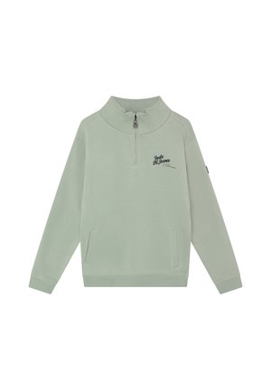 Lysegrøn langærmet pullover med kort lynlås, to forlommer og lille sort tekst på venstre bryst med teksten "Indn Bl Jeans."