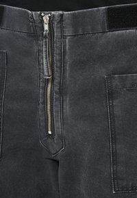 Aries UNISEX - Calças de ganga largas - black