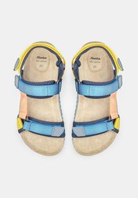 Värvilised sandaalid, millel on sinine ja kollane reguleeritav rihm, beezist nahast tald ja oranžid detailid. Suurus 33.