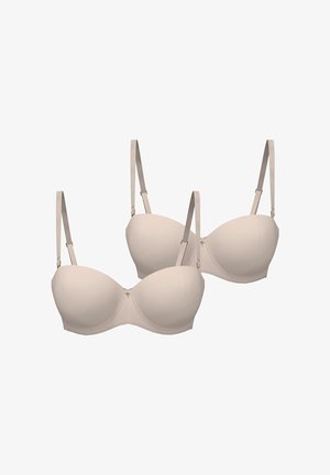 Sujetadores acolchados beige con aros, tirantes ajustables y detalles de costura sutiles. Presentan herrajes en tono dorado y textura de tela suave.