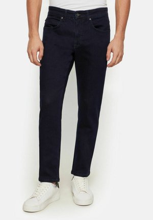- Jeansy Slim Fit
