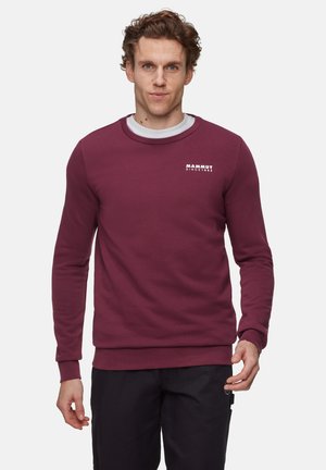 Burgundy crew neck sweatshirt made of soft cotton blend, featuring a white logo on the chest and ribbed cuffs and hem.