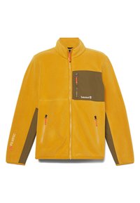 Gelbe Fleecejacke mit einer braunen Brusttasche, orangefarbenen Reißverschlussakzenten und einem Etikett am linken Ärmel. Hat einen hohen Kragen und Reißverschlusstaschen.