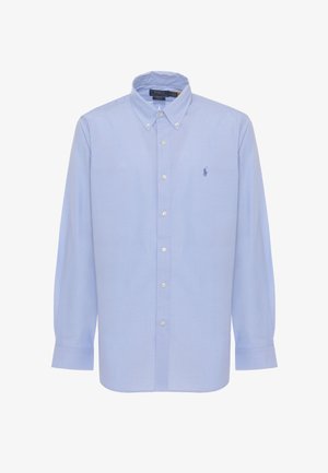 Camicia azzurro chiaro a maniche lunghe con colletto abbottonato e piccolo logo ricamato sul petto sinistro.