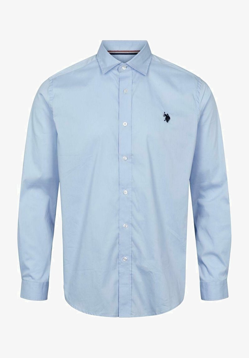 Chemise bleu clair à boutons, manches longues, col pointu et logo brodé sur la poitrine gauche. Fabriquée en coton lisse.