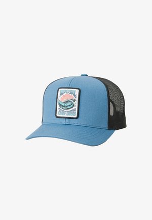 Casquette trucker en mesh bleu et noir avec un patch arborant une vague, un soleil et le texte "Rip Curl Surfing Co 69" sur le panneau avant.