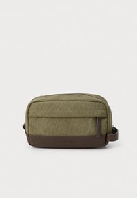 Rectangular cosmetic bag in olive green fabric with a brown leather base. Features a zip closure and a front pocket for additional storage.