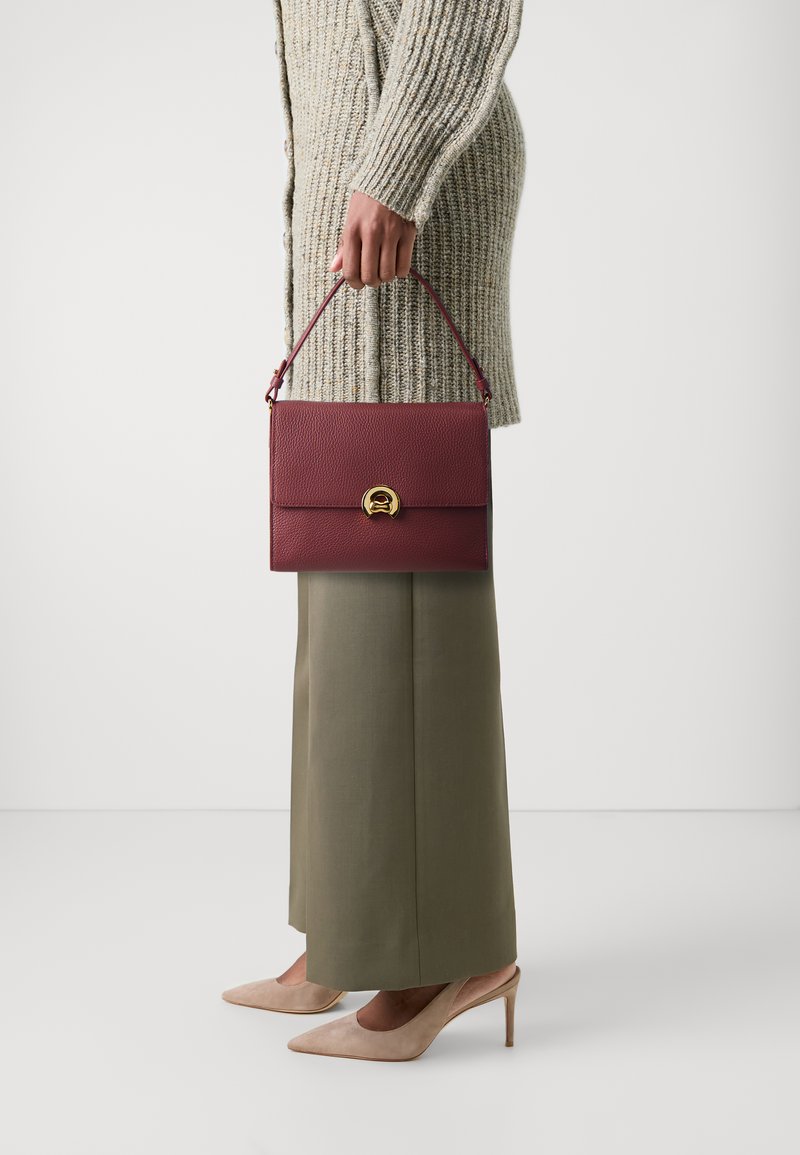 Coccinelle BINXIE - Borsa a mano - brown