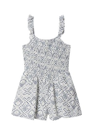 Tutina bianca senza maniche con motivo floreale geometrico blu, spalline arricciate, corpetto arricciato e pantaloncini ampi.