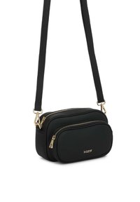 Geantă crossbody neagră, realizată din material texturat, având două compartimente cu fermoar, accesorii din aur și o curea ajustabilă.