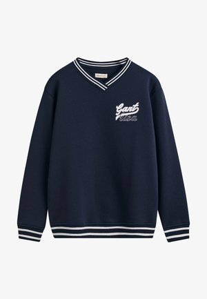 Sweatshirt bleu marine avec un col en V, des détails en logo blanc sur la poitrine et des poignets et un ourlet rayés. Fabriqué en tissu doux et texturé.