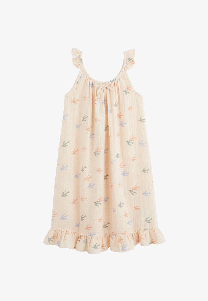 Robe sans manches de couleur pêche claire avec des bretelles volantes, ornée d'un imprimé de petits oiseaux colorés. L'ourlet présente un détail de volants froncés.