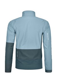 Light blue jacket with a high collar; contrasting dark blue lower section; features smooth texture and logo on sleeve; long sleeves.