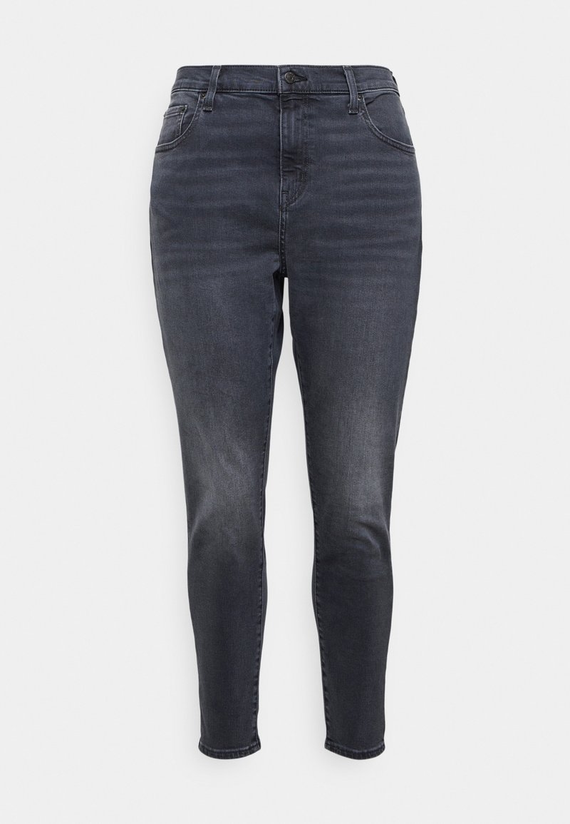 Dunkelgraue enganliegende Jeans aus Denim. Eigenschaften: Vorderer Knopf- und Reißverschluss, fünf Taschen und dezente Auswaschungen im Stoff.