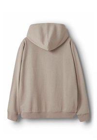 Šviesiai smėlio spalvos džemperis su gaubtu, minkštos tekstūros, laisvo silueto, ilgomis rankovėmis ir tiesia apačia su juosta.