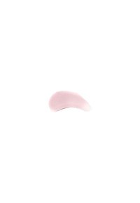 Crème rose clair avec une forme lisse et courbée, présentant une finition brillante. La texture semble douce et crémeuse, suggérant une application facile.