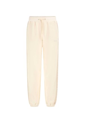 Krämfärgade sweatpants med elastisk midja, snörning, sidofickor och ribbade muddar. Slät textur med sidostripesaccenter.