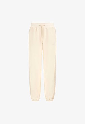 Pantaloni sportivi color crema con vita elasticizzata, cordoncino, tasche laterali e polsini a costine. Tessuto liscio con dettagli a striscia laterale.