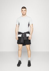 Dynafit ALPINE PRO - Lühikesed püksid (õue) - black out