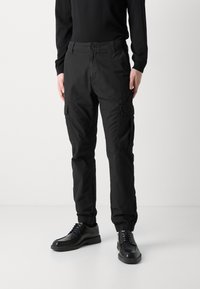 Tommy Jeans ETHAN - Calças cargo - black