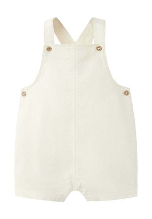 Combinaison pour bébé couleur crème avec bretelles croisées et boutons en bois sur les côtés et à l'avant.