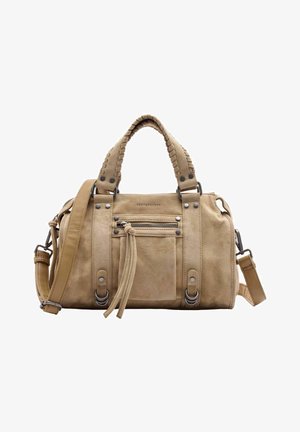 Sac à main en daim beige avec poignées tressées, poche avant zippée avec pompons, et bandoulière ajustable avec détails en métal.