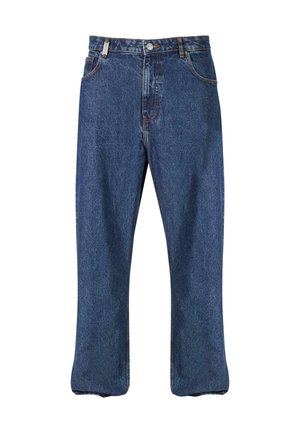 Jean en denim bleu foncé, présentant une coupe droite, un style classique à cinq poches et des coutures visibles le long des coutures.