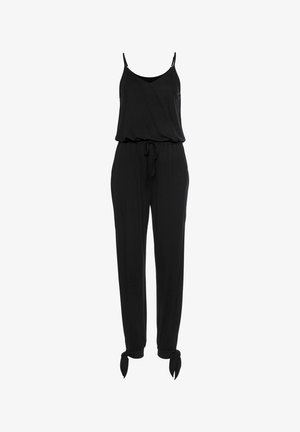 Schwarzer Jumpsuit mit dünnen Trägern, einem Kordelzug an der Taille und schmal zulaufenden Beinen mit gebundenen Bündchen. Hergestellt aus glattem, leichtem Material.