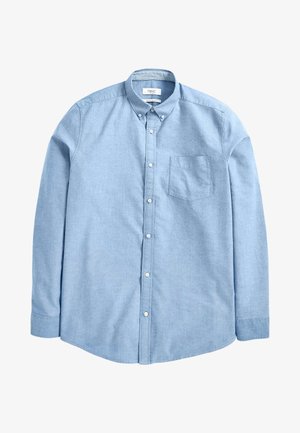 Camicia button-up azzurro chiaro realizzata in tessuto morbido, con colletto a punte, maniche lunghe, taschino sul petto e bottoni bianchi.