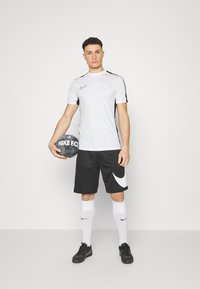 Nike Performance TOP  - Camiseta deportiva - white/black