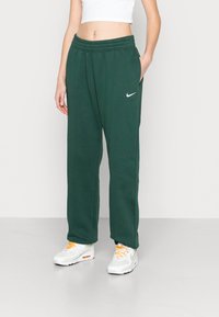 Nike Sportswear W NSW ESSNTL PANT FLC TREND - Calças de fato de treino - pro green/white