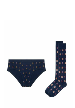 Navy blue briefs and knee-high socks with gingerbread men and candy cane patterns, holiday-themed underwear set.