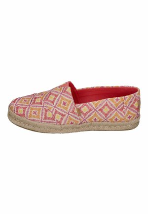 Patterned slip-on shoe with pink, orange, and yellow geometric designs, featuring a jute rope sole and a bright red interior lining.