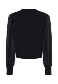 Maglione nero con orlo a coste aderente e maniche a sbuffo trasparenti, che mostra una lavorazione a maglia testurizzata e un semplice scollo rotondo.