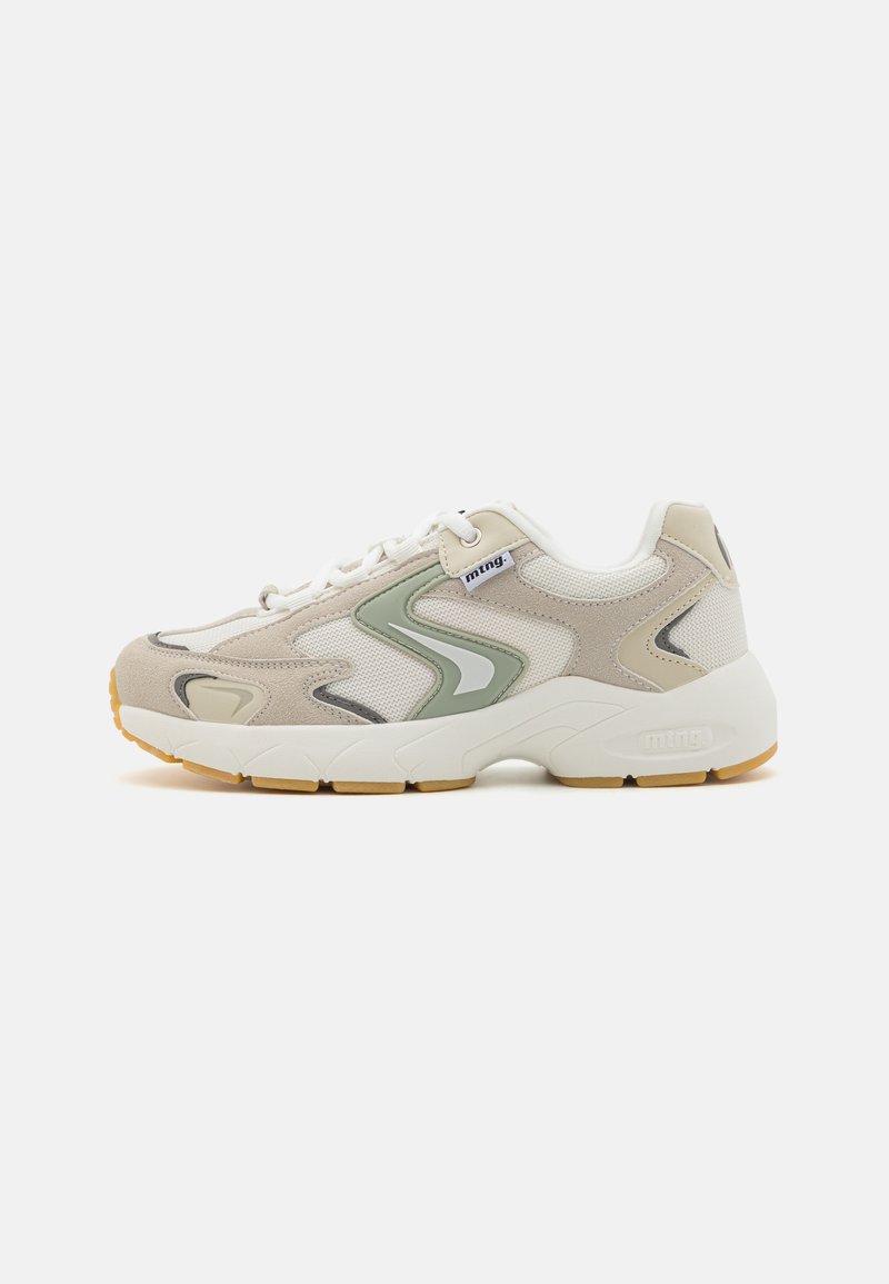 Beige athletic sneakers with mesh and suede upper, green accents, white laces, and a textured rubber sole. Features a brand logo on the side.