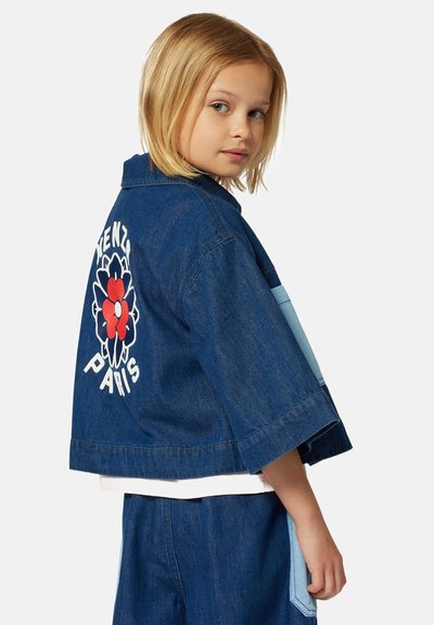 Denim jacket with short sleeves, blue wash, featuring a floral design and "KENZO PARIS" text on the back, contrasting fabric panel detail.